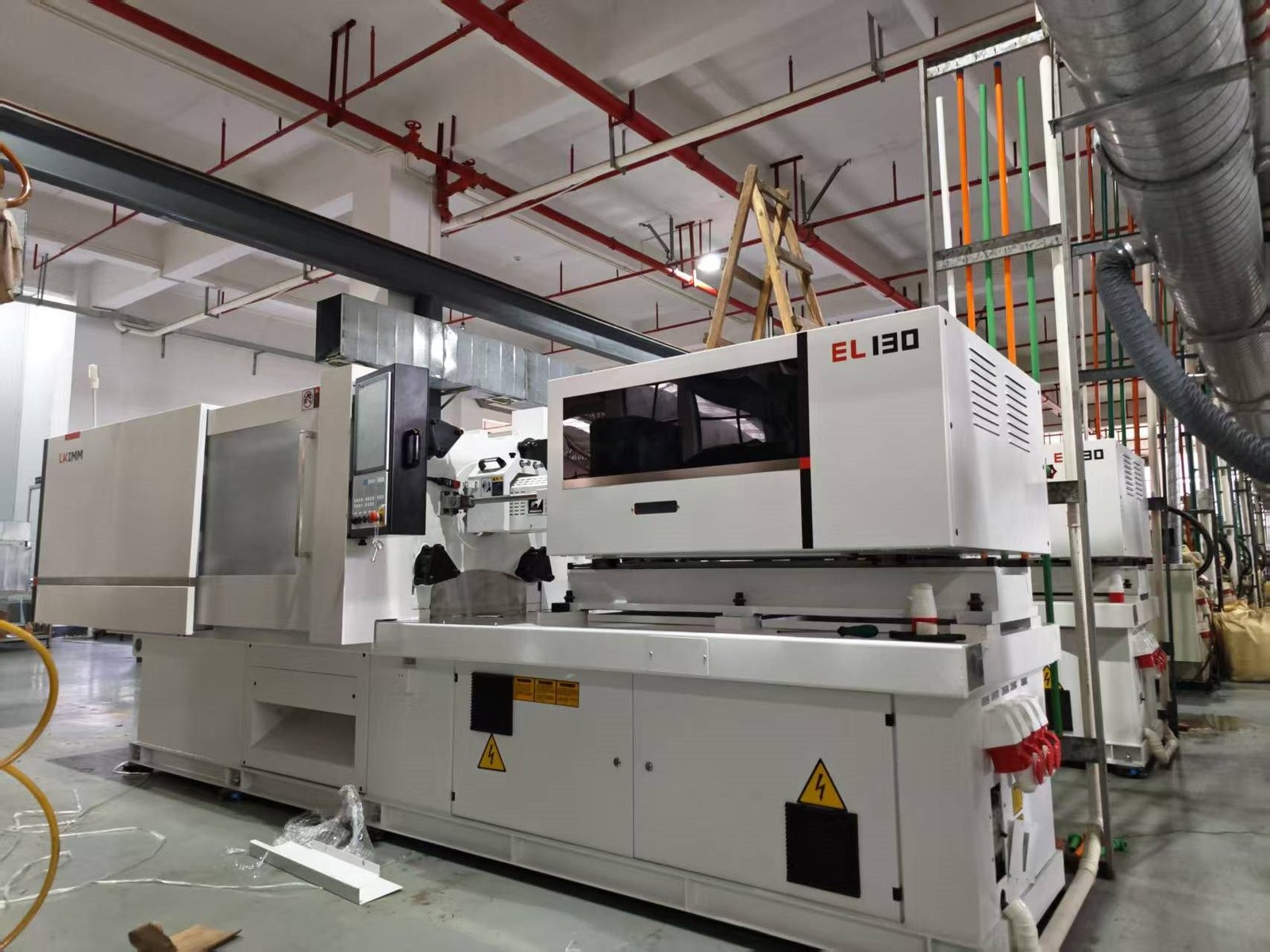 Injection molding workshop for plastic parts production