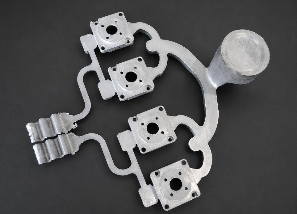 As-cast aluminum die casting part before CNC machining with casting runner and raw surface