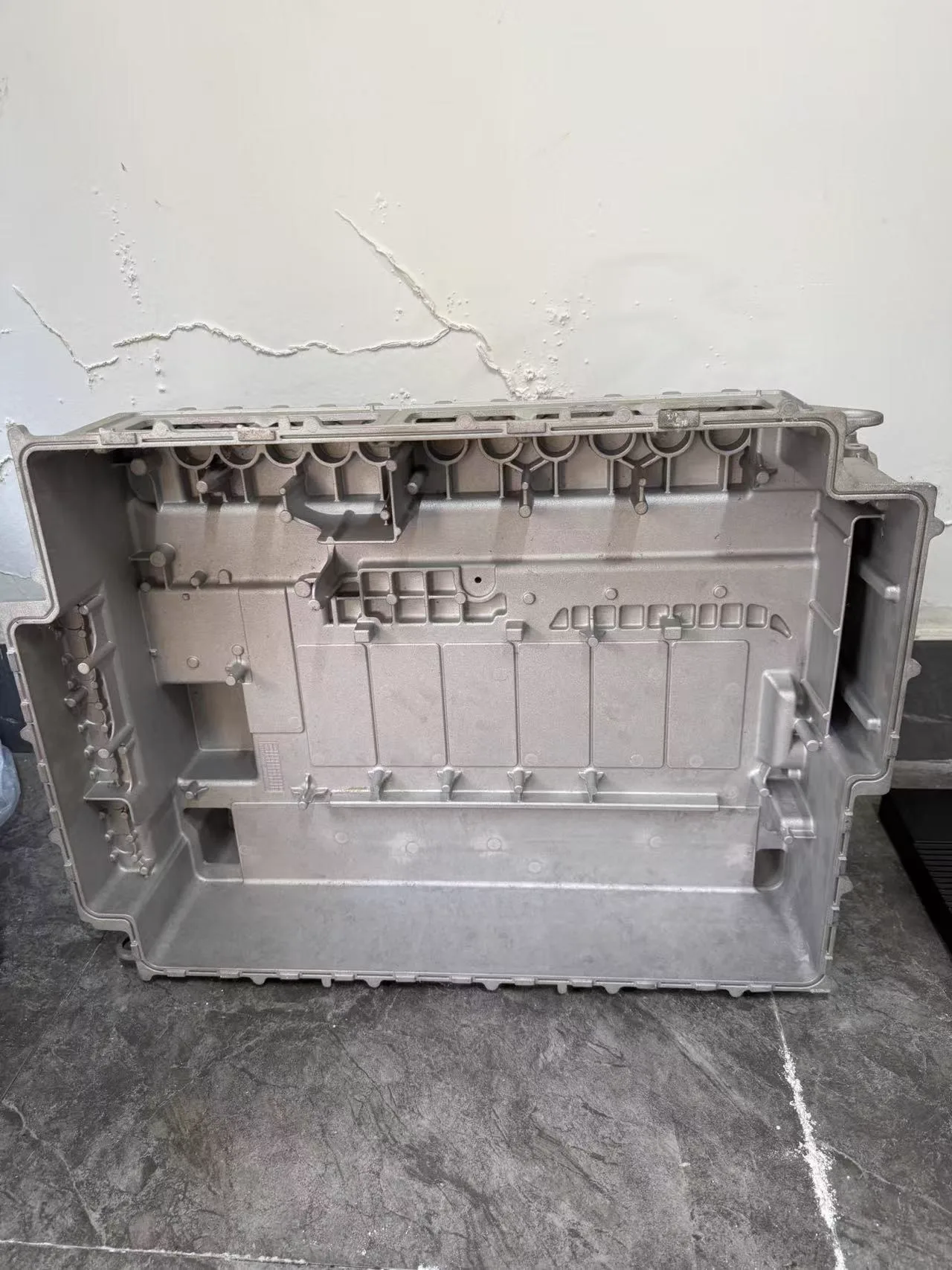 Raw metal component before surface finishing process