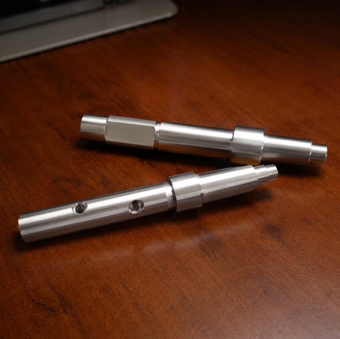 Hard chrome plated shaft component for wear resistant OEM applications