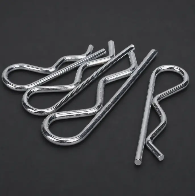 Precision stamped metal clips and retainers