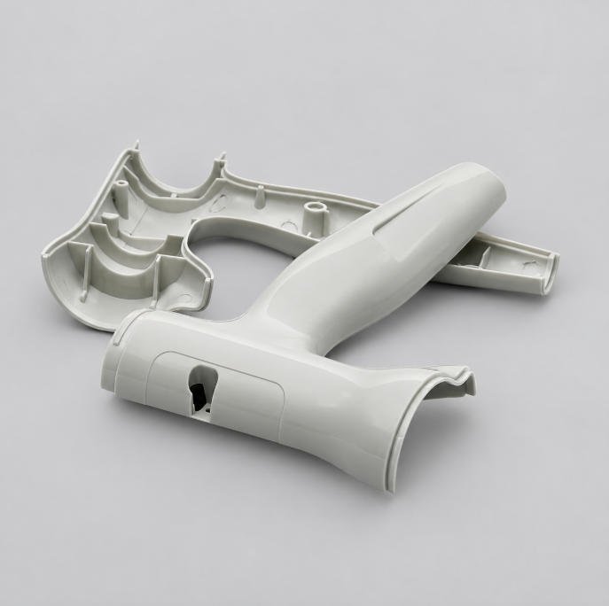 white structural injection molded parts with ribs and bosses
